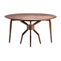 Ronde houten tafel met unieke voetconstructie